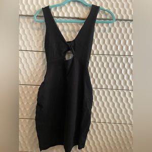 FREE PEOPLE BEACH Black Sleeveless Twist Front Cutout Knit
Bodycon Mini